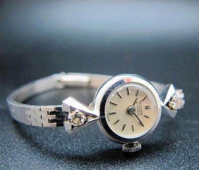 null RICHARD. Montre bracelet de dame en or blanc 750°/°° (18k), cadran circulaire...