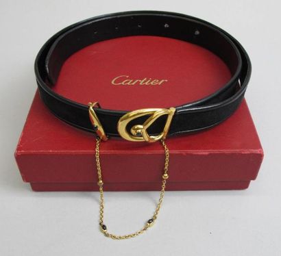 null CARTIER. Ceinture "Must de Cartier" en cuir et nubuk noir, boucle en métal doré...
