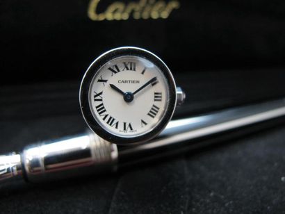 null CARTIER. Stylo plume "secret watch" laqué noir finition platine, plume en or...