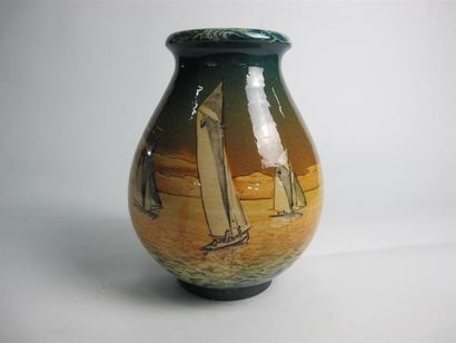 null MASSIER Clément (1844-1917)
Vase ovoïde à col évasé et piédouche à décor émaillé...
