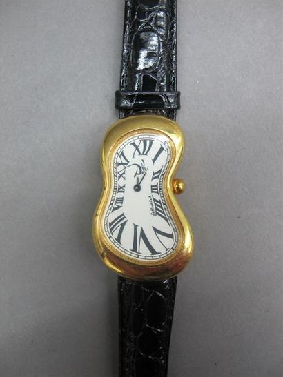 null SOFTWATCH par Salvator DALI. Montre en métal doré stylisant la montre molle,...