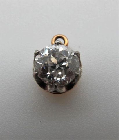 null Pendentif en or jaune 750°/°° et argent orné d'un diamant taille ancienne en...