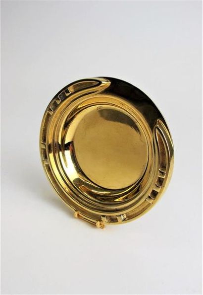 null HERMES Paris
Vide poche en bronze doré modèle fer à cheval.
diam: 9,5 cm 