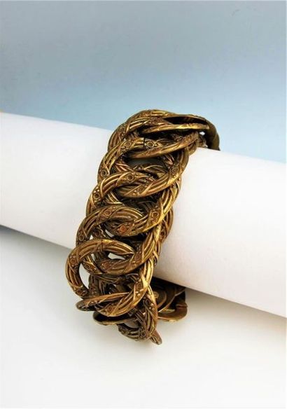 null JOSEFF of Hollywood
Bracelet en métal doré formé d'une succession d'anneaux...