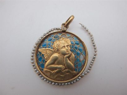 null Médaille en or jaune 750°/°° (18k) à décor d'ange sur fond d'émail translucide,...