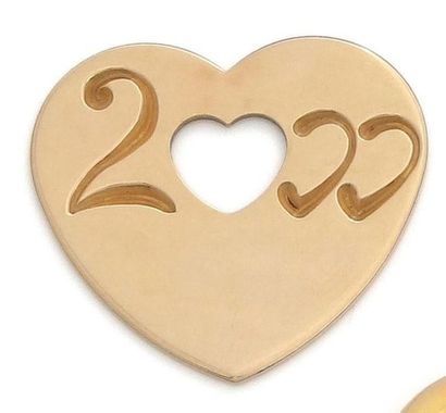 null POIRAY
Two heart pendants in 750°/°° yellow gold, one engraved 2000 on the reverse...