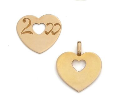 null POIRAY
Two heart pendants in 750°/°° yellow gold, one engraved 2000 on the reverse...