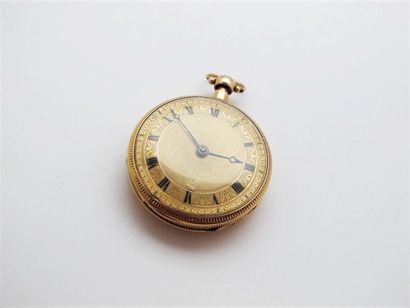null Pocket watch in 750°/°° yellow gold, the yellow gold guilloché dial with palmette...