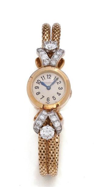null JAEGER-LECOULTRE around 1940
Women's wristwatch in 18k yellow gold and platinum,...