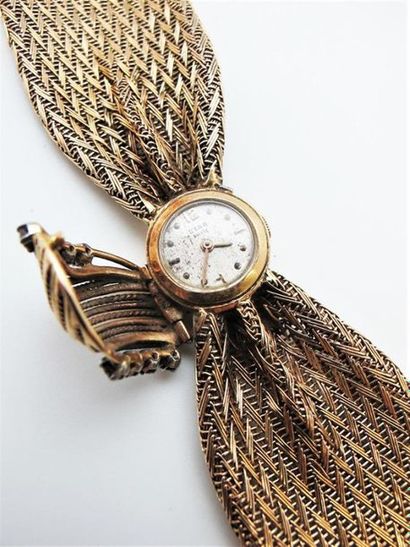 null STAR
Montre-bracelet de dame en or jaune 750°/°° , le cadran rond beige à index...