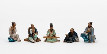 null CHINE, XXème siècle

Lot de cinq personnages en porcelaine émaillée polychrome...