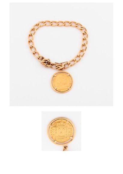 null Bracelet en or jaune (750) à maille cheval retenant une pièce de 20 Francs or,...