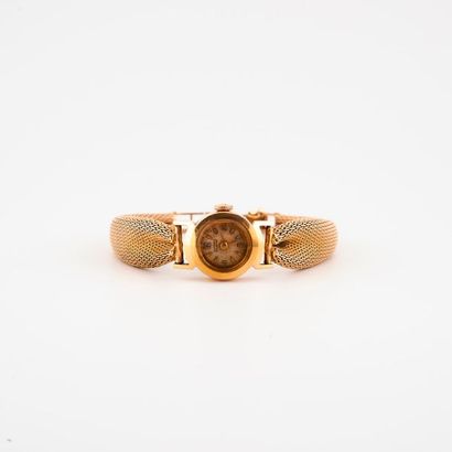 JUVENIA, 
Montre bracelet de dame en or jaune (750) 
Boîtier circulaire, cadran à...