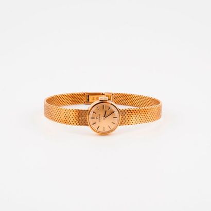 TISSOT 

Montre bracelet de dame en or jaune (750) 

Boîtier rond. 

Cadran à fond...