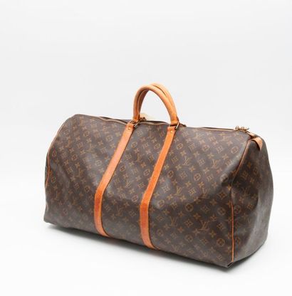 Louis VUITTON, Keepal 

Sac 48h en toile Monogram et cuir, anses porté main.

Dim....