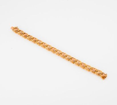 null Bracelet articulé en ors rose et jaune (750) à maillon en double huit entrelacés...