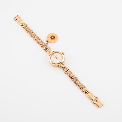 ETERMATIC 

Montre bracelet de dame en or jaune (750). 

Boîtier rond, cornes en...