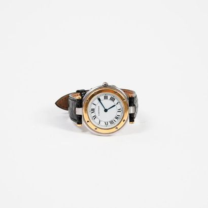 Must de CARTIER, Santos 

Montre bracelet d'homme. 

Boîtier rond en acier et or...