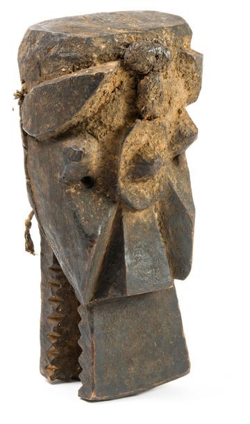 AFRIQUE LIBÉRIA, Toma 
Masque oiseau.
En bois sculpté à patine brune à stylistique...