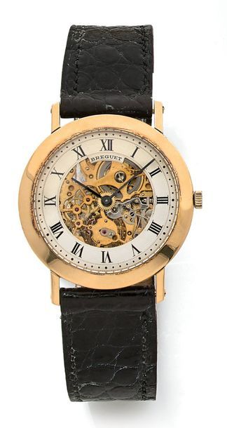 BREGUET Montre bracelet d'homme en or 750 millièmes.
Cadran squelette, contour argenté...