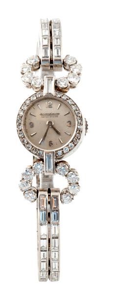 JAEGER-LECOULTRE Montre bracelet de dame en or gris 750 millièmes.
Cadran argenté...