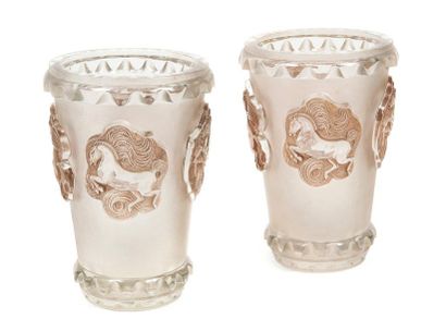 RENE LALIQUE (1860-1945) 
Pair of Camargue vases.
Model created in 1942.
Proof in...