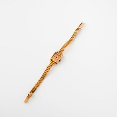 ZENITH 

Montre bracelet de dame en or jaune (750). 

Boîtier carré. 

Cadran à fond...