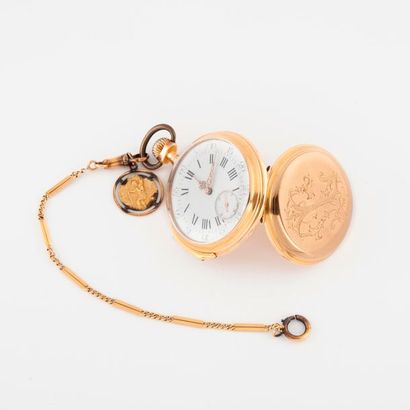 null Pocket watch in yellow gold (750).

Encrypted back cover. 

White enamelled...