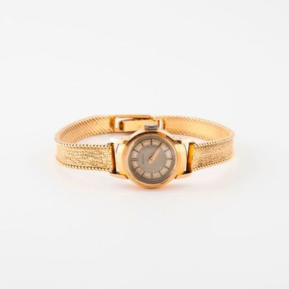 ZENITH 

Montre bracelet de dame en or jaune (750) 

Boîtier rond. 

Cadran à fond...