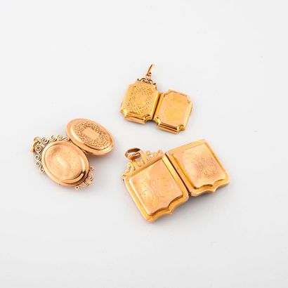 Set of three yellow gold (750) picture pendants,...