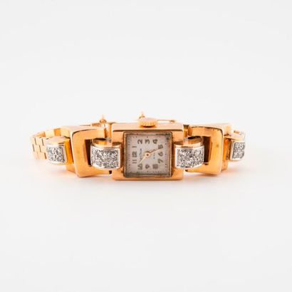 CRISTALOR 

Ladies' bracelet watch in yellow gold (750) Tank style. 

Rectangular...