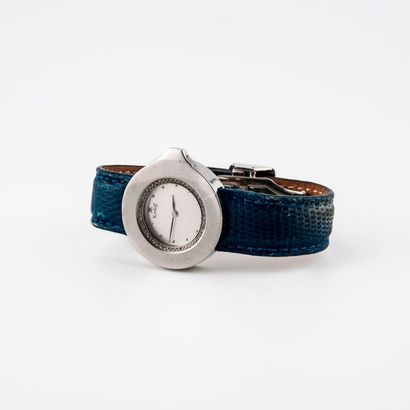 KORLOFF 

Ladies' wristwatch.

Round steel case, bezel set with small grain-set diamonds.

Dial...