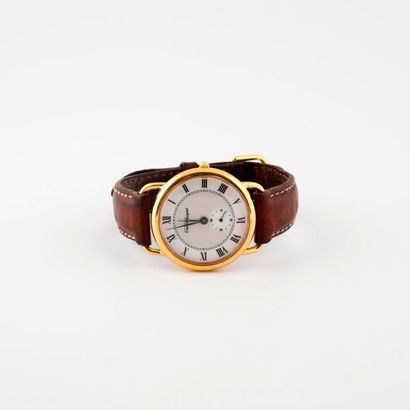 EMILE PEQUIGNET 

Man's wristwatch. 

Round case in gold metal and steel. 

White...