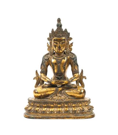 TIBET, XIXème siècle 
Statuette d'Amitabha en bronze doré et traces de polychromie,...