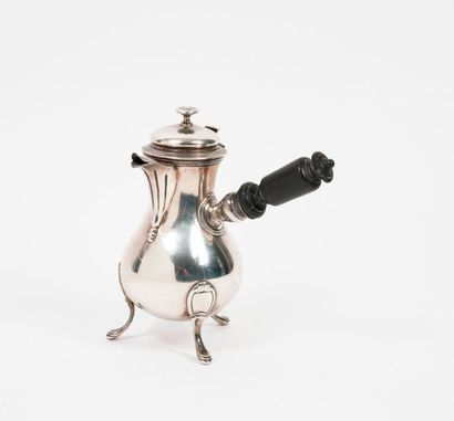null 
Small tripod chocolate maker in silver (950), with fluted beak and medallion...