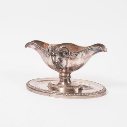 null Sauceboat on oval pedestal, with screwed plate, silver (950), edged with gadroons,...