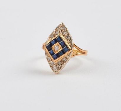  Marquise ring in yellow gold (750) formed by a square of calibrated sapphires centred...