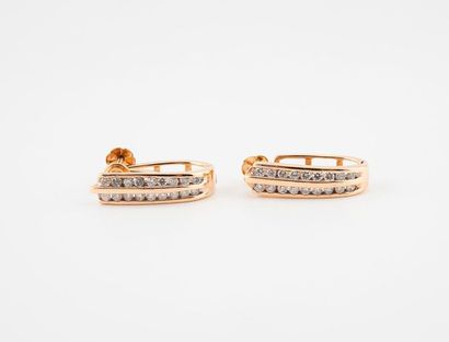  Pair of yellow gold (585) elongated creole shaped ear clips, set with two lines...