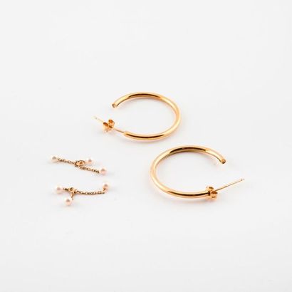 Pair of creoles in yellow gold (750) with...
