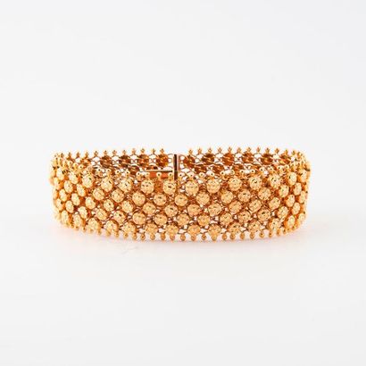 null Bracelet ruban articulé en or jaune (750) à motif de fleurettes sur fond de...