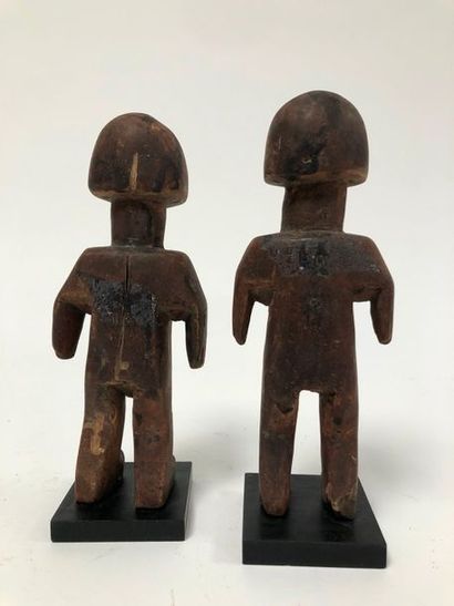 null GHANA, Ewé

Pair of twins.

In wood, represented standing, arms detached from...