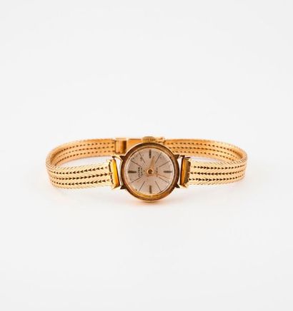 Montre bracelet de dame en or jaune (750)...