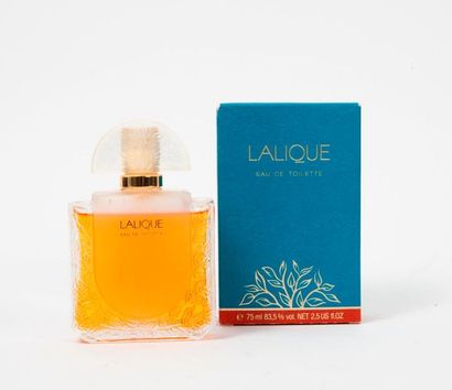 LALIQUE France, Eau de toilette 75 ml. 

Perfume bottle in molded crystal and partly...