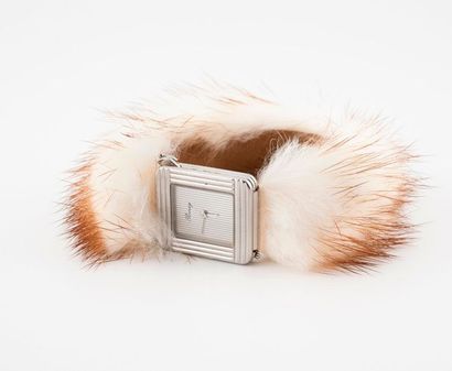 POIRAY, Ma Première 

Ladies' wristwatch.

Rectangular steel case with rounded corners...