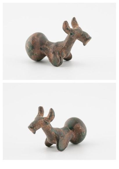 null Crouching ibex in bronze with green patina.
Beginning of the first millennium.
Length:...