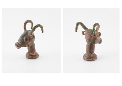 null Pendant in bronze with green patina forming a head of ibex.
Beginning of the...