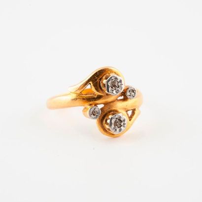 null Yellow and white gold (750) volute ring punctuated with rose-cut diamonds in...