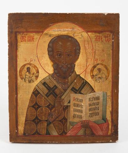 RUSSIE, XIXème Saint Nicolas bénissant tenant le livre des écritures, deux saints...