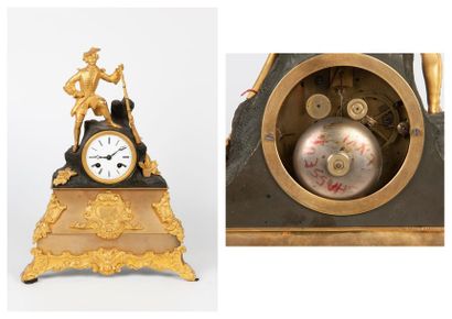 Seconde moitié du XIXème siècle Pendule borne en bronze et laiton patinés et dorés...