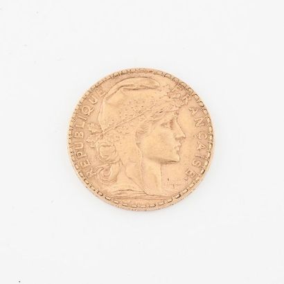 France 20 gold francs coin, Third Republic, 1907. 
Net weight : 6.4 g. 
 Scratches...